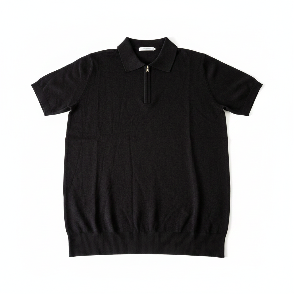 Polo zippé noir flat lay